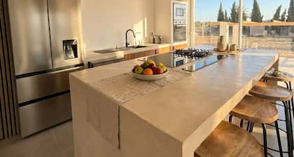 Ibiza-style designer villa · Private pool · 5 min from the beach, 15 min airport