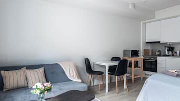 Superior Studio, City View | Living area | 42-cm flat-screen TV with cable channels