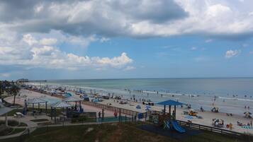 On the beach, sun loungers, beach towels
