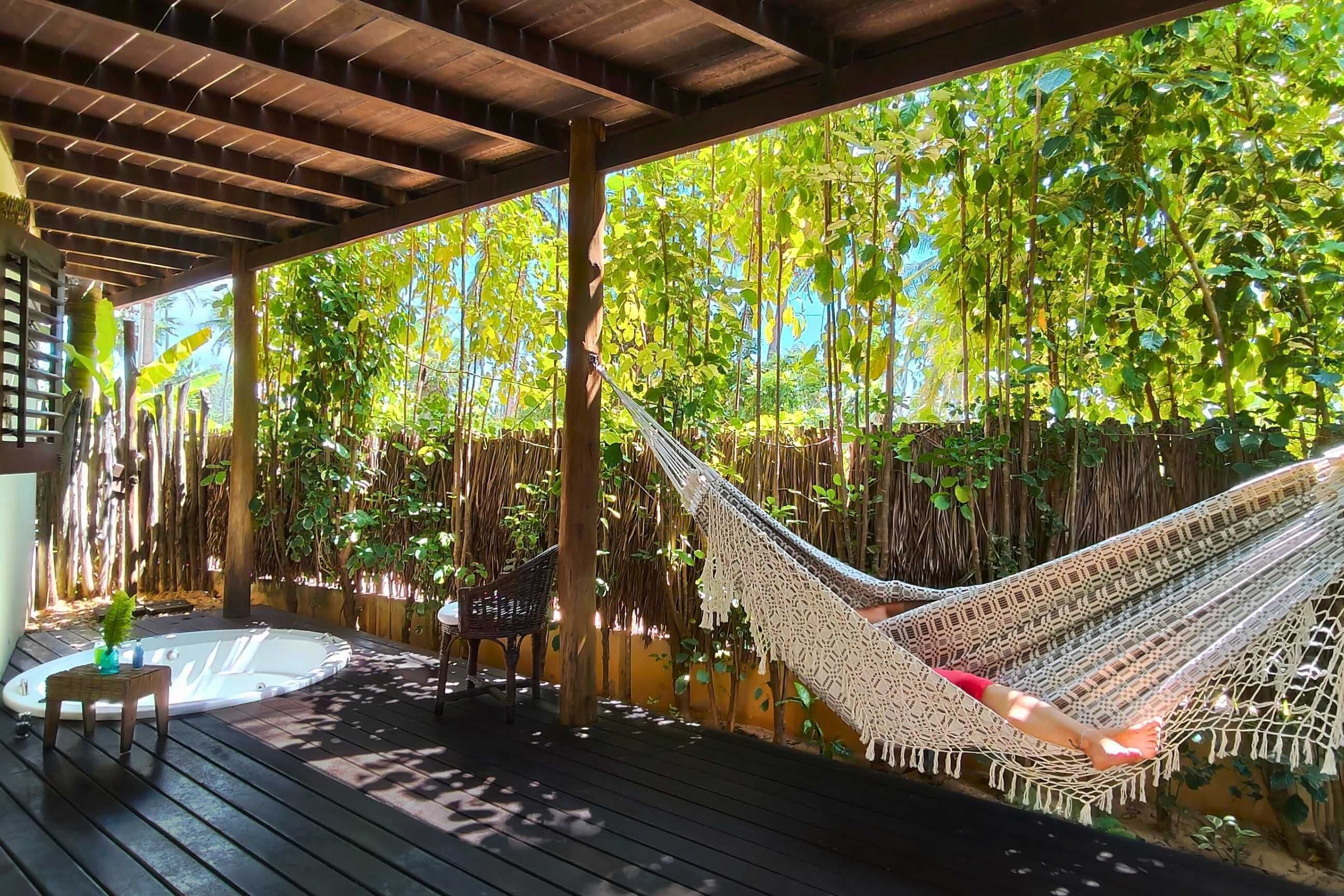 Luxury Triple Room, Air conditioning, Garden View | Outdoor spa tub