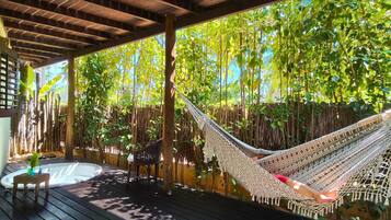 Luxury Triple Room, Air conditioning, Garden View | Outdoor spa tub