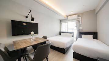 Triple Room, Balcony, City View | Desk, free WiFi