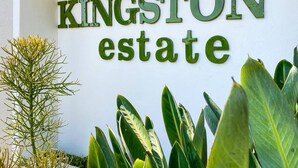 A sign for 'KINGSTON ESTATE' with a white background and green lettering. - Coastal Chic in the Heart of Ballito 3-bed Oasis (Ballito)