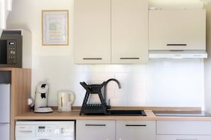 Fridge, microwave, coffee/tea maker, toaster