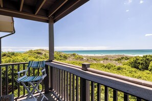 A balcony with a view of the beach and ocean. - Southwinds A9 - 2 Bedrooms, 1.5 Baths, Oceanfront Condo (Atlantic Beach)