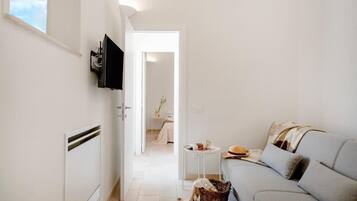 Habitación estándar, vista a la ciudad | Área de sala de estar