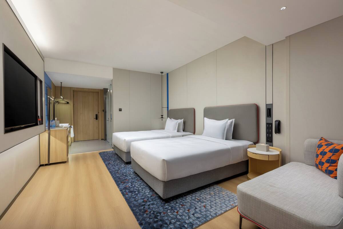 Premium bedding, down comforters, desk, laptop workspace