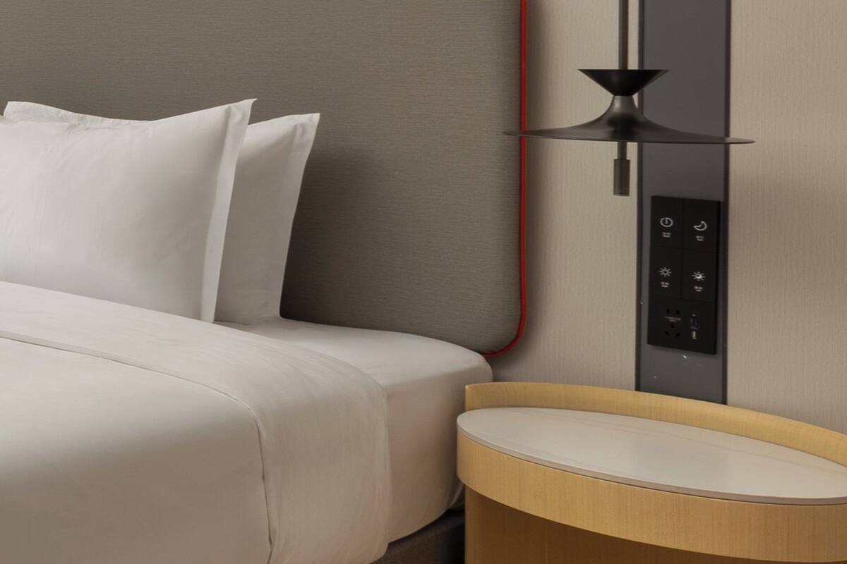 Premium bedding, down comforters, desk, laptop workspace