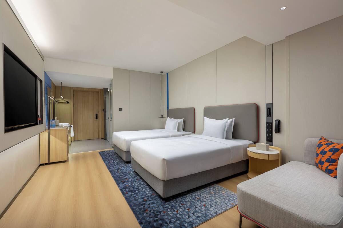 Premium bedding, down comforters, desk, laptop workspace
