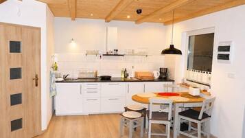 Fridge, stovetop, coffee/tea maker, toaster