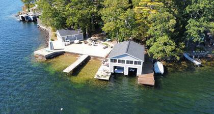 VINTAGE BOATHOUSE ON PAUGUS BAY LAKE WINNIPESAUKEE