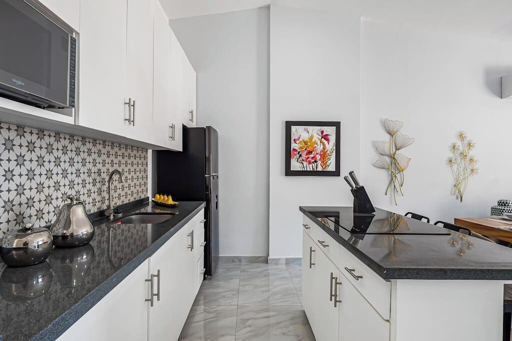 Apartment, Mehrere Betten, eingeschränkter Meerblick (Mara 607 at Morgan Residences) | Eigene Küche