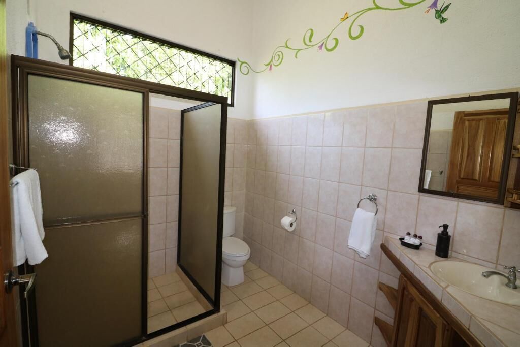Villa Deluxe, vista al jardín | Baño | Toallas 