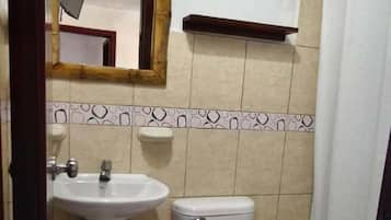 Double Room, Partial Ocean View | Bathroom | Shower, towels, soap, shampoo