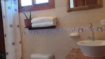 Shower, towels, soap, shampoo