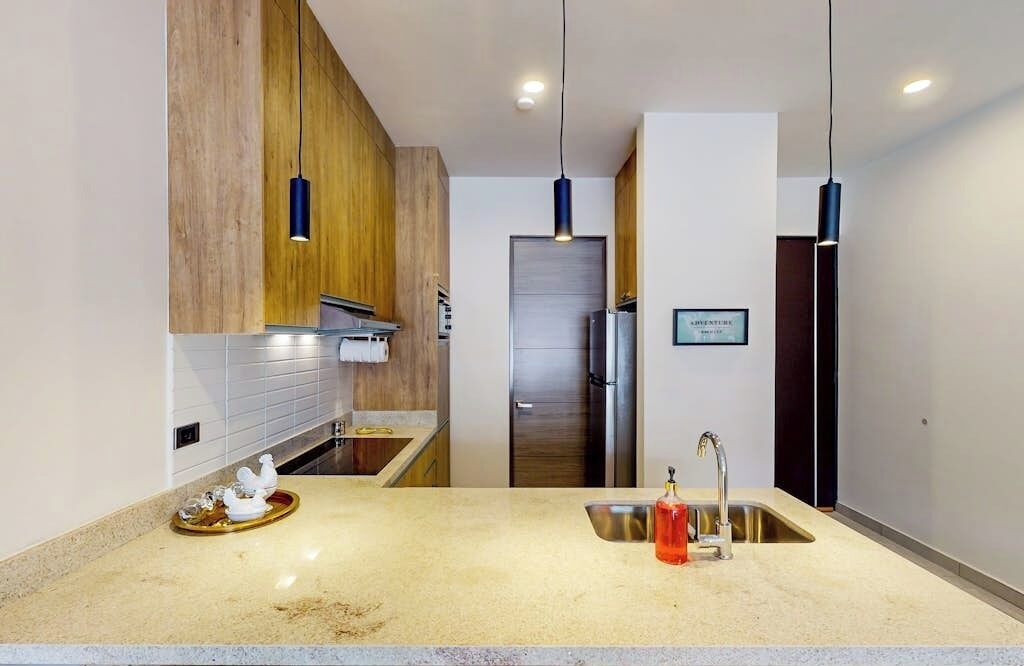Departamento, varias camas, vista a la alberca (Maralta D 102) | Cocina privada