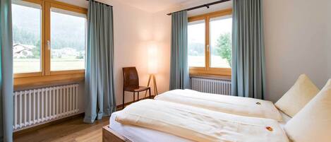 2 quartos, Wi-Fi de cortesia, roupa de cama