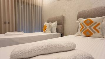 Ropa de cama de alta calidad, colchones con pillow-top y wifi gratis