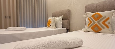 Premium bedding, pillowtop beds, WiFi (free), bed sheets