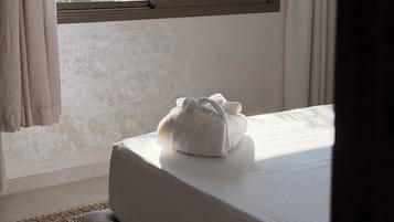 Premium bedding, pillow-top beds, free WiFi, bed sheets