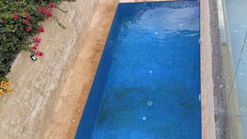 Outdoor pool, pool umbrellas, pool loungers