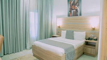 In-room safe, desk, laptop workspace, blackout curtains