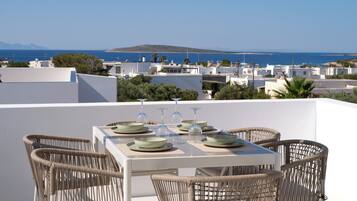 Duplex, Partial Sea View | Outdoor dining