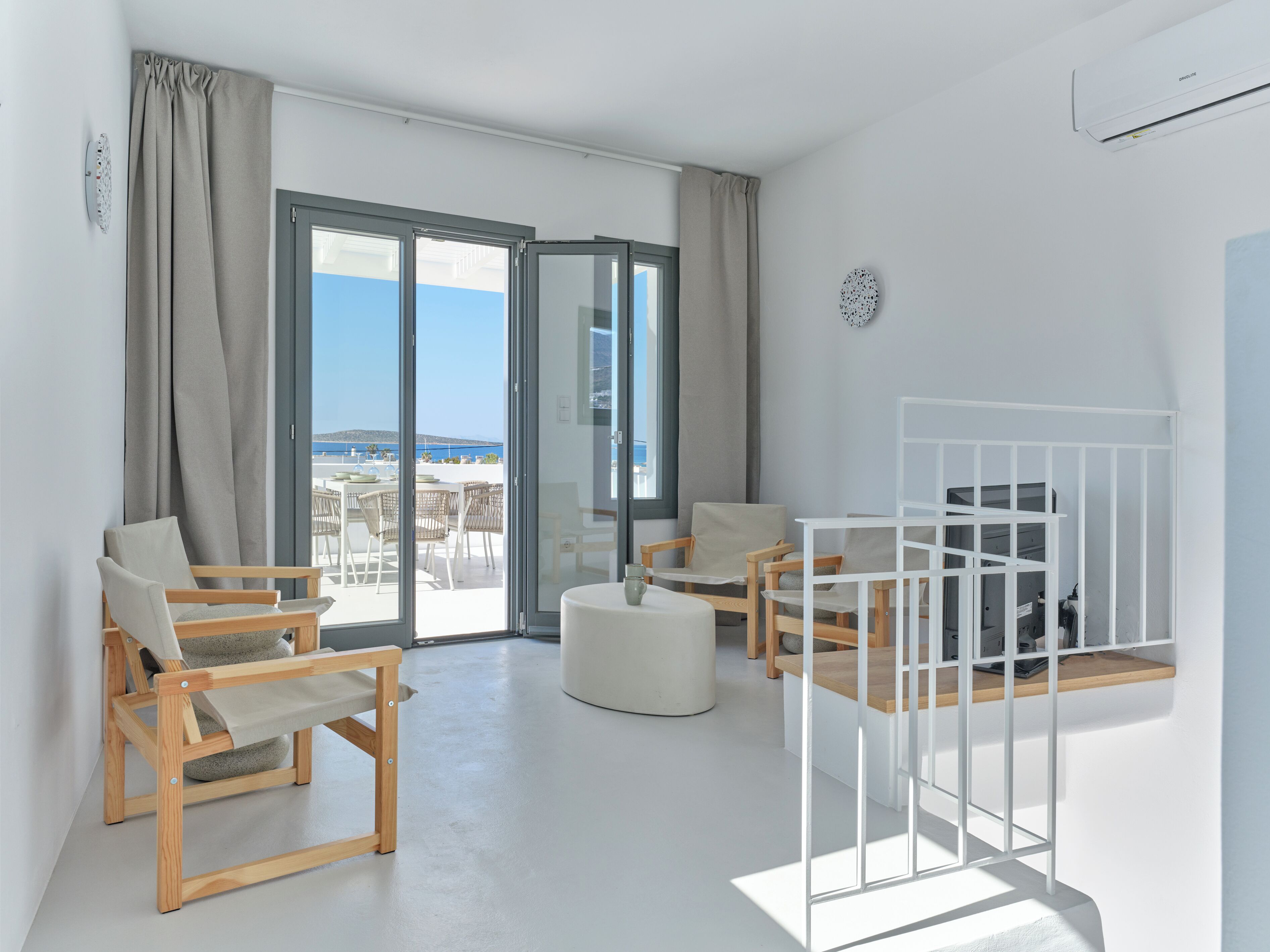 Duplex, Partial Sea View | Living area | 34-inch flat-screen TV with cable channels