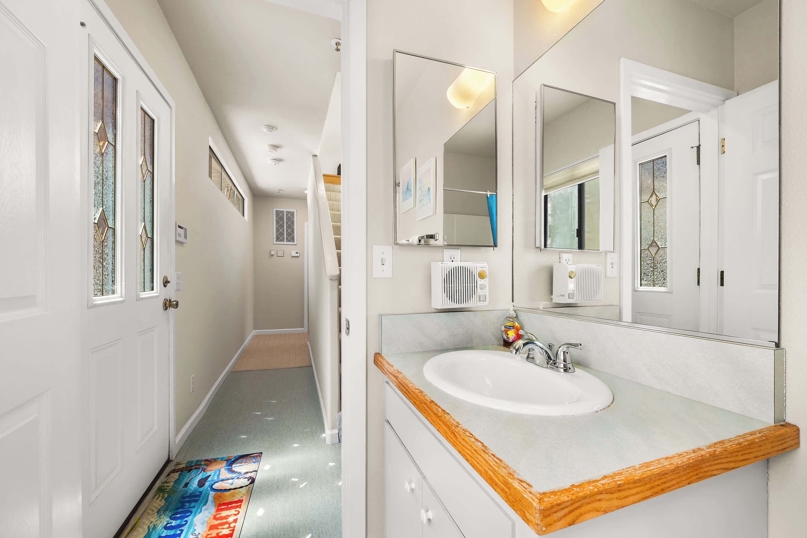 Shower, hair dryer, towels, shampoo