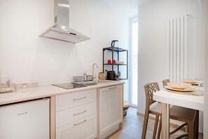 Deluxe-suite - balkon - byudsigt | Privat køkken