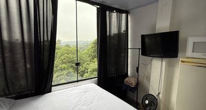 Studio apartment with forest view, 20 minutes from São Paulo city.