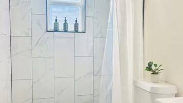 Hair dryer, towels, soap, shampoo