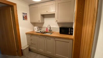 Fridge, microwave, electric kettle, toaster