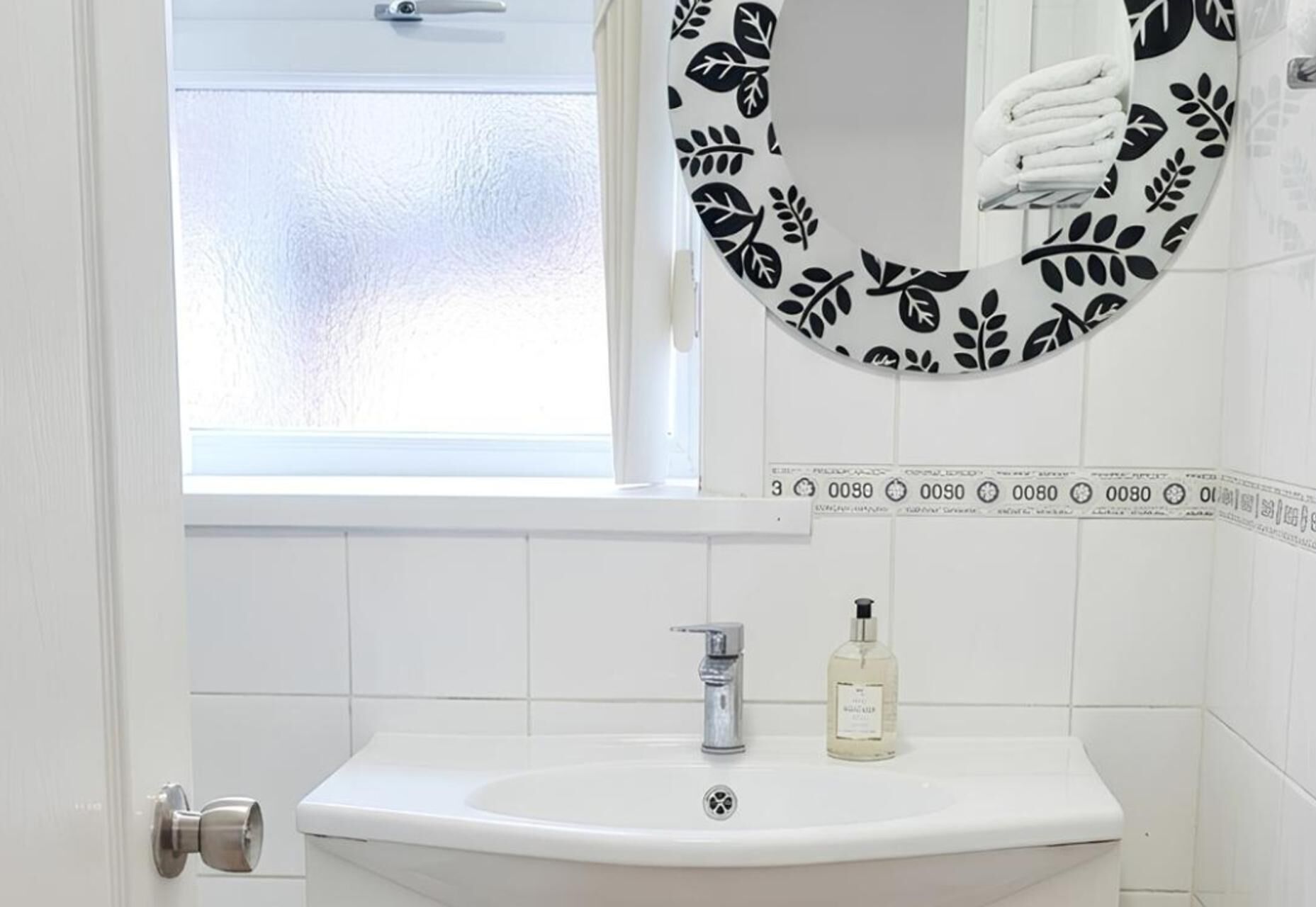 Combined shower/bathtub, deep-soaking bathtub, towels