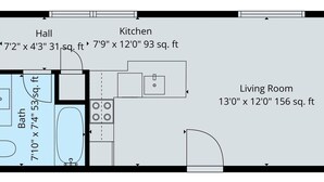 A floor plan with a bedroom, living room, kitchen, and bathroom. - 1 BR King Suite - Freshwater Inn - Bridgman, MI (Bridgman)