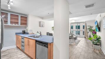 Apartment, Balcony, Partial Sea View | Private kitchen | Full-sized fridge, microwave, oven, stovetop