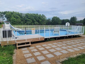 Outdoor pool - Spacious, pet-friendly, 4-bedroom house on 7 open acres with a pool (Greenville)