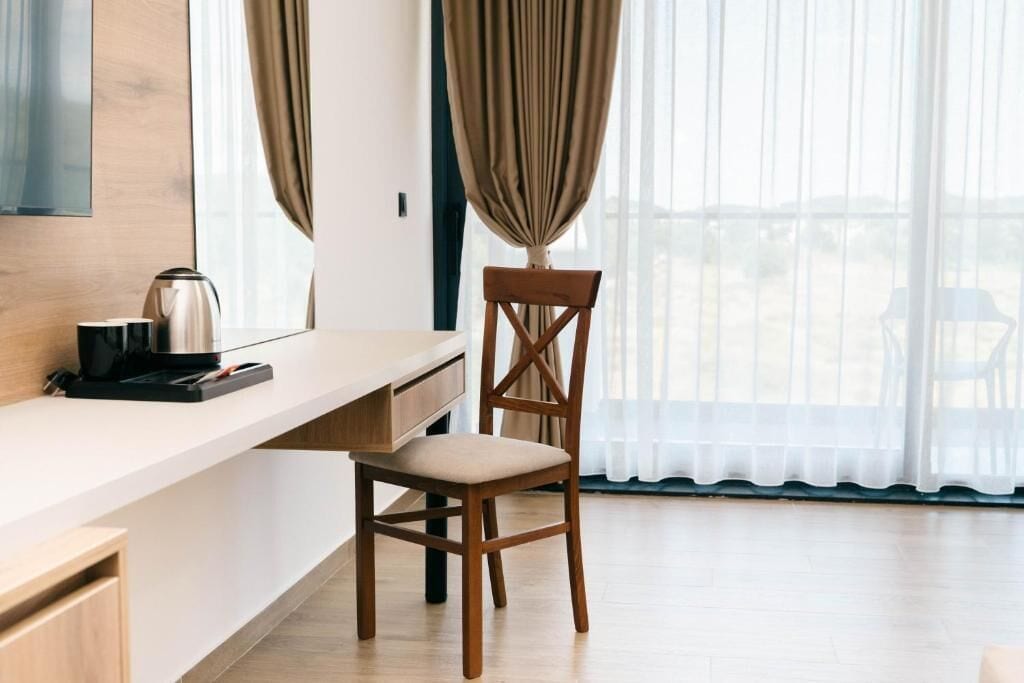Premium bedding, desk, laptop workspace, WiFi (free)