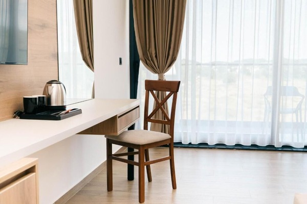 Premium bedding, desk, laptop workspace, WiFi (free)