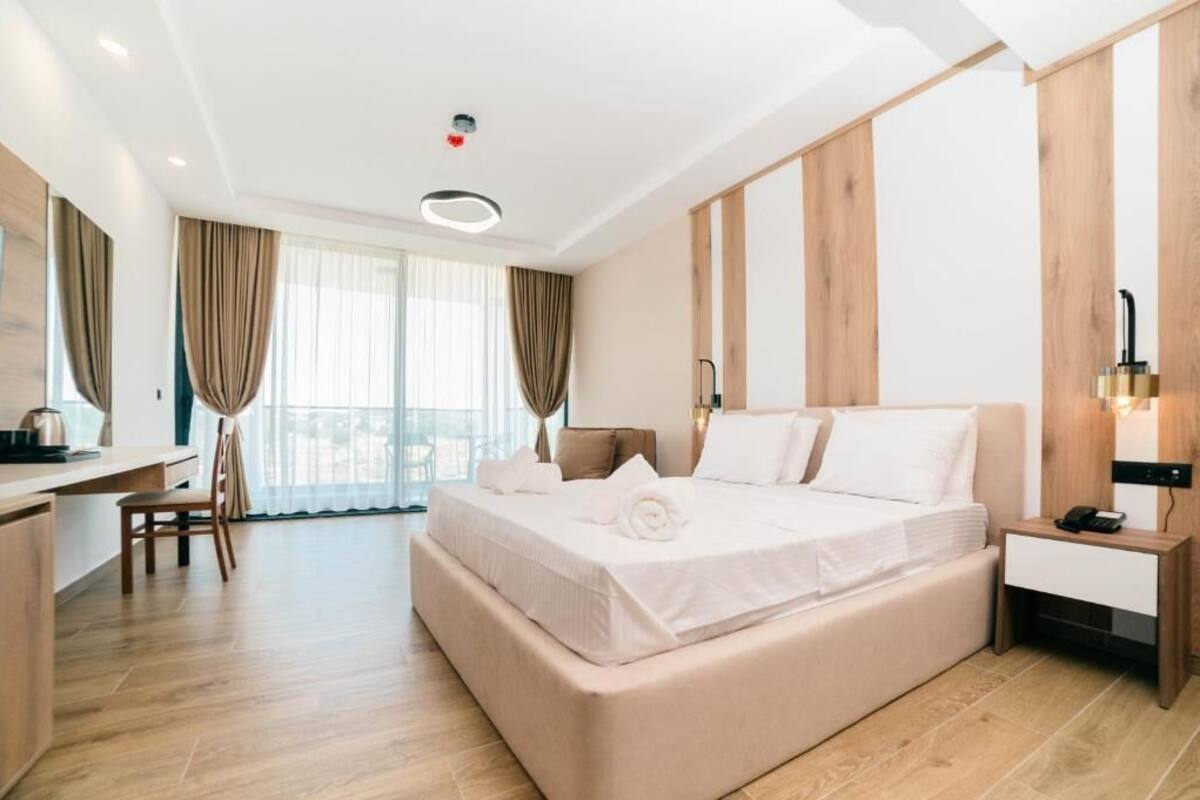 Premium bedding, desk, laptop workspace, WiFi (free)