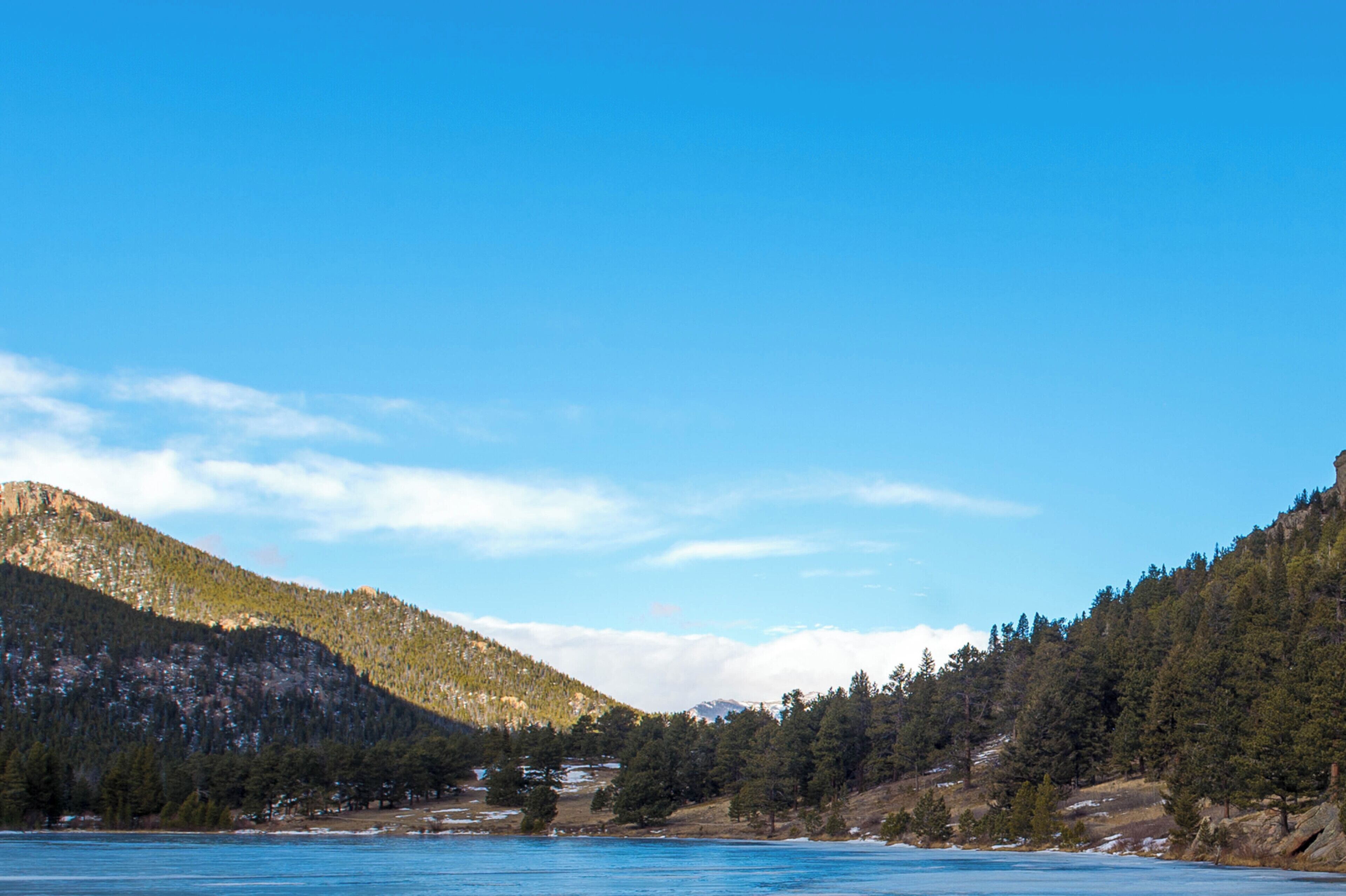 A mountainous landscape with a clear sky.
