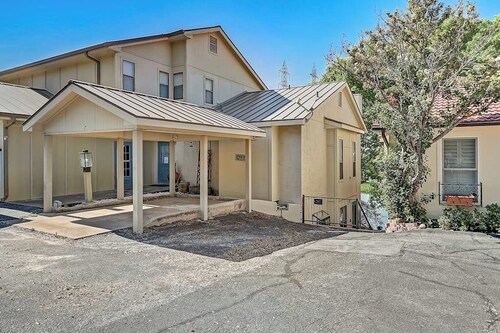 Dog-friendly Water View Condo With Inviting Porch, AC, W/d, & Modern Charm
