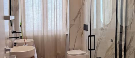 Hair dryer, towels, toilet paper