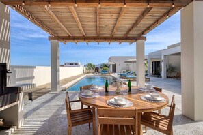 Outdoor dining - Oceanfront Luxury in East Cape Private Beachfront (Ligth House Point States)