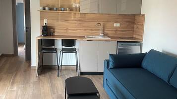 Apartment, Balcony, Partial Sea View | Living area