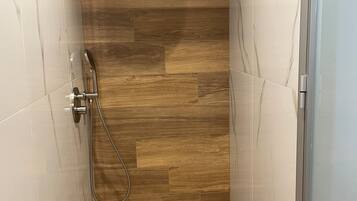 Comfort Studio, Balcony | Bathroom | Shower, hair dryer, slippers, towels