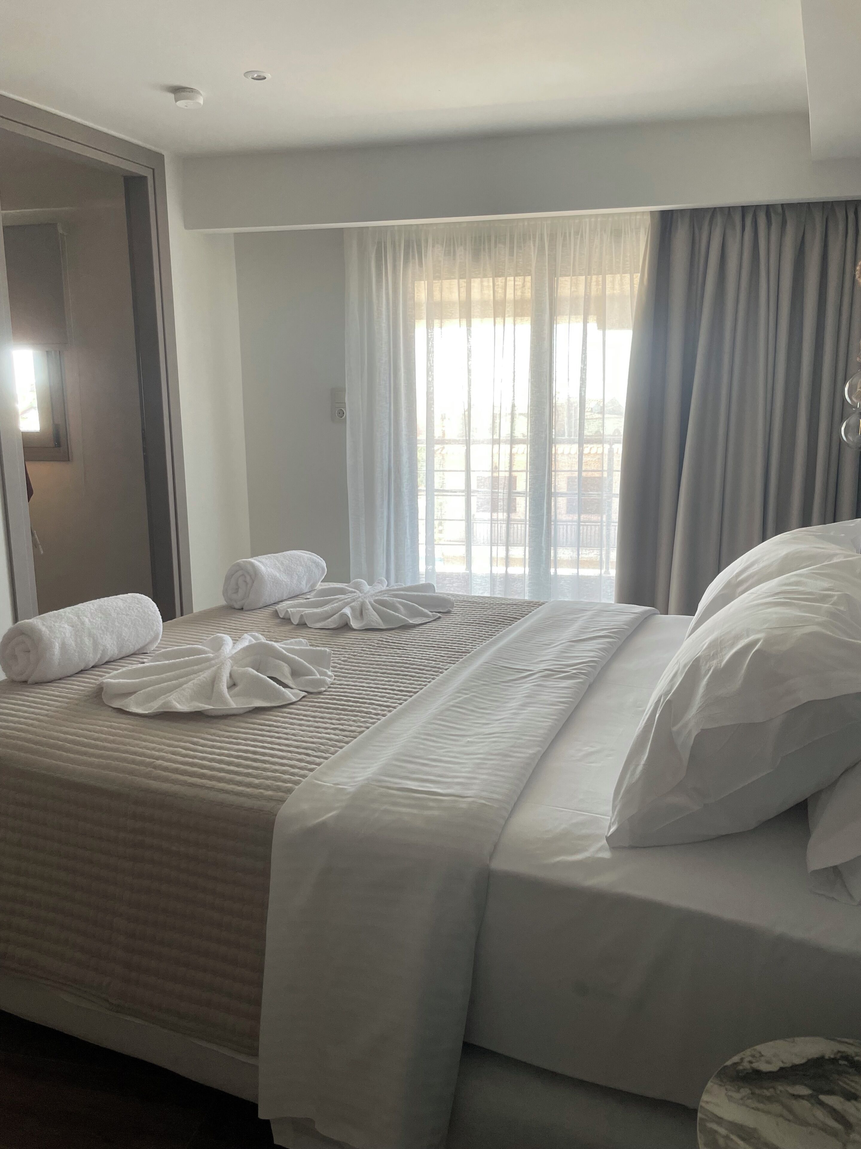 Apartment, Balcony, Partial Sea View | In-room safe, blackout curtains, free WiFi