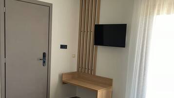 Apartment, Balcony | Living area | 32-cm Smart TV with satellite channels