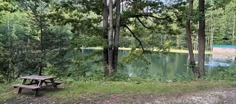 Glamping tent overlooking pond