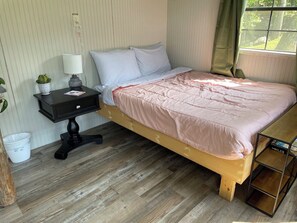 1 bedroom, bed sheets - Pond front cabin flooded with sunlight, just steps away from throwing a line in. (Diana)